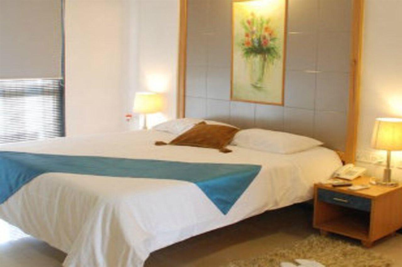 Treebo Edha Suites Koramangala Бенґалуру Екстер'єр фото